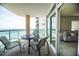 Private balcony with seating offers beautiful views of the beach and ocean at 1903 S Ocean Blvd. # 1110, North Myrtle Beach, SC 29582