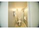 Functional bathroom with a shower, and a toilet with stylish gray walls at 1903 S Ocean Blvd. # 1110, North Myrtle Beach, SC 29582