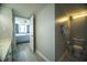 Practical bathroom adjacent to bedroom with toilet and tiled shower at 1903 S Ocean Blvd. # 1110, North Myrtle Beach, SC 29582