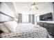 Bright bedroom with a cozy bed, flat screen TV, and plenty of natural light at 1903 S Ocean Blvd. # 1110, North Myrtle Beach, SC 29582