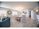 Bright dining area adjacent to the living room with seating for six at 1903 S Ocean Blvd. # 1110, North Myrtle Beach, SC 29582