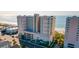 An eye-level view of a multi-story condo building offering ocean views at 1903 S Ocean Blvd. # 1110, North Myrtle Beach, SC 29582