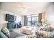 Comfortable living room features stylish decor, access to a balcony and bright ocean views at 1903 S Ocean Blvd. # 1110, North Myrtle Beach, SC 29582