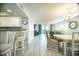 Open-concept living and dining area with tile floors and ocean views at 1903 S Ocean Blvd. # 1110, North Myrtle Beach, SC 29582