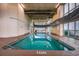 Indoor pool area with natural light and exposed ceiling, creating a modern and inviting recreational space at 1903 S Ocean Blvd. # 1110, North Myrtle Beach, SC 29582