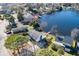 An aerial view captures the community's waterfront homes nestled along the serene lake with lush greenery at 1931 Lakeview Circle, Surfside Beach, SC 29575