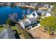 Aerial view of a lakeside community featuring homes with well-maintained yards and private access to the tranquil water at 1931 Lakeview Circle, Surfside Beach, SC 29575