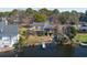 Lakeside homes with backyard decks, docks, and fire pit offering the ultimate in outdoor living and waterfront relaxation at 1931 Lakeview Circle, Surfside Beach, SC 29575