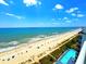 Gorgeous beach scene and clear ocean waters with the nearby pool available to residents at 2007 S Ocean Blvd. # 1506, Myrtle Beach, SC 29577