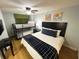 Cozy bedroom featuring a queen bed, bunk beds and ceiling fan for added comfort at 2007 S Ocean Blvd. # 1506, Myrtle Beach, SC 29577