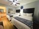 Bright bedroom featuring two queen beds with decorative throw, and unique wall art at 2007 S Ocean Blvd. # 1506, Myrtle Beach, SC 29577