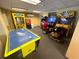 Well-lit game room featuring a variety of arcade games and air hockey at 2007 S Ocean Blvd. # 1506, Myrtle Beach, SC 29577