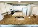 Kitchen featuring granite counters and a bar with seating at 2007 S Ocean Blvd. # 1506, Myrtle Beach, SC 29577
