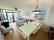 Open-concept living and dining area with stylish furnishings and breathtaking ocean views at 2007 S Ocean Blvd. # 1506, Myrtle Beach, SC 29577