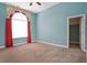 Bedroom boasts natural light, a ceiling fan, and walk-in closet at 210 Natures View Circle, Pawleys Island, SC 29585