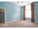Bedroom featuring natural light, neutral carpet, and a ceiling fan at 210 Natures View Circle, Pawleys Island, SC 29585