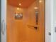 Interior view of residential elevator featuring wood paneling and controls at 210 Natures View Circle, Pawleys Island, SC 29585