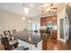 Kitchen with stainless steel appliances, dark cabinetry, and a large island at 210 Natures View Circle, Pawleys Island, SC 29585