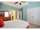Cozy main bedroom featuring plush carpets and adjoining bath at 210 Natures View Circle, Pawleys Island, SC 29585
