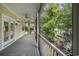 Screened-in porch with ceiling fans, view of landscaped backyard at 210 Natures View Circle, Pawleys Island, SC 29585