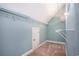 Walk-in closet with built-in wire shelving and a door for privacy at 210 Natures View Circle, Pawleys Island, SC 29585
