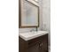 Elegant bathroom vanity featuring a modern sink, stylish mirror, and sleek wood cabinetry at 216 Deer Trace Circle, Myrtle Beach, SC 29588