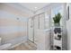 Bathroom featuring walk-in shower, tile floors, and linen storage at 2504 Heritage Loop # 2504, Myrtle Beach, SC 29577