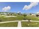Expansive community green space featuring a putting green, benches, and walkways for residents to enjoy at 2504 Heritage Loop # 2504, Myrtle Beach, SC 29577