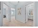 Bright hallway leading to a bathroom and bedroom, showcasing the home's functional layout and design at 2504 Heritage Loop # 2504, Myrtle Beach, SC 29577