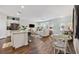 Open living area with kitchen view, modern furnishings, and hardwood floors at 2504 Heritage Loop # 2504, Myrtle Beach, SC 29577