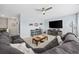 Inviting living room with cozy seating, a large television, and stylish decor, perfect for relaxation at 2504 Heritage Loop # 2504, Myrtle Beach, SC 29577