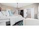 Spacious main bedroom featuring hardwood floors, ensuite bathroom and a view of the closet at 2504 Heritage Loop # 2504, Myrtle Beach, SC 29577