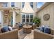 Cozy patio with comfortable seating, fire pit, and shade sail for outdoor relaxation at 2504 Heritage Loop # 2504, Myrtle Beach, SC 29577