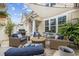 Relaxing patio space with lounge chairs, dining area, and a grill for entertaining at 2504 Heritage Loop # 2504, Myrtle Beach, SC 29577