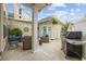 Inviting covered patio with comfortable seating, a grill, and charming decorative details for outdoor living at 2504 Heritage Loop # 2504, Myrtle Beach, SC 29577