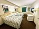 Cozy bedroom featuring two beds and beachy decor at 2701 S Ocean Blvd. # 720, North Myrtle Beach, SC 29582