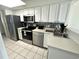 Modern kitchen with stainless steel appliances and white cabinetry at 2701 S Ocean Blvd. # 720, North Myrtle Beach, SC 29582