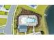 Overhead view of community pool with ample lounge seating and beautiful landscaping at 314 Bumble Circle, Murrells Inlet, SC 29576