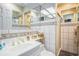 Bathroom has a shower and a sink with mirror backsplash at 328 Waterside Dr., Myrtle Beach, SC 29577