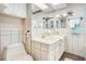 Bathroom featuring a double sink vanity, ample lighting, and a traditional design at 328 Waterside Dr., Myrtle Beach, SC 29577