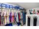 Organized walk-in closet with clothing racks and storage bins for efficient storage at 328 Waterside Dr., Myrtle Beach, SC 29577