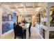 Elegant dining room featuring coffered ceilings, mural wall, and built-in cabinetry at 328 Waterside Dr., Myrtle Beach, SC 29577