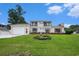 Charming two-story home boasts lush lawn, brick accents, and an attached two-car garage at 328 Waterside Dr., Myrtle Beach, SC 29577