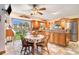 Charming kitchen with tile flooring, wood cabinets and stainless steel appliances and view of outdoor space at 328 Waterside Dr., Myrtle Beach, SC 29577