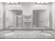 Bathroom with double sinks, granite countertops, large mirrors and modern lighting at 3547 Ladybank Loop, Myrtle Beach, SC 29577