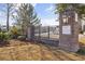 Landscaped entrance featuring brick signage and decorative iron fencing at 3547 Ladybank Loop, Myrtle Beach, SC 29577