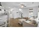 Open-concept living space, seamlessly connects the living room, dining area, and modern kitchen at 3547 Ladybank Loop, Myrtle Beach, SC 29577