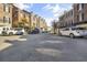 Street with brick buildings, parked cars and sidewalks at 3547 Ladybank Loop, Myrtle Beach, SC 29577