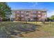 Well-maintained condos offer a landscaped backyard with grills and green space at 3935 Gladiola Ct. # 302, Myrtle Beach, SC 29588