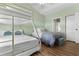 Well lit room with bunk beds, queen size bed, and plenty of space at 3935 Gladiola Ct. # 302, Myrtle Beach, SC 29588